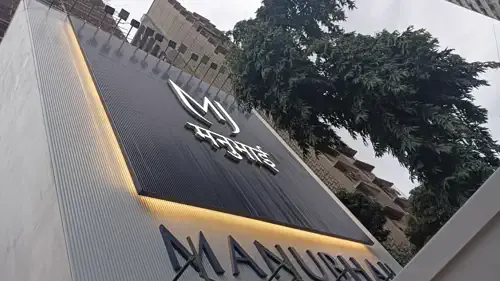 Manubhai Jewellers signage, installed view