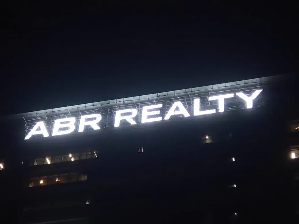 Professional signage installation and maintenance team across India